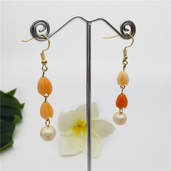 Earrings With Pikake Flower Beads And A Pearl In Different Colors