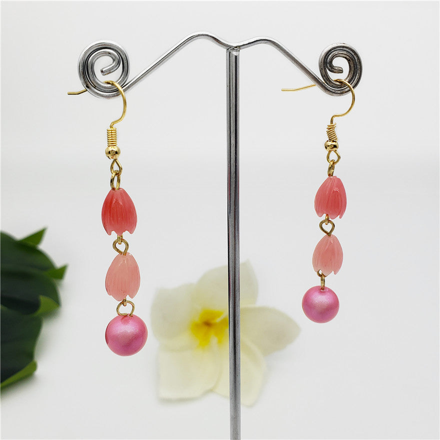 Earrings With Pikake Flower Beads And A Pearl In Different Colors