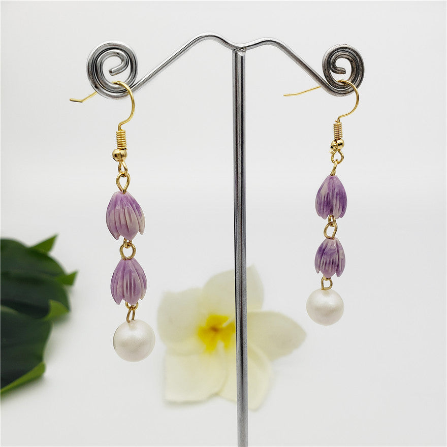 Earrings With Pikake Flower Beads And A Pearl In Different Colors