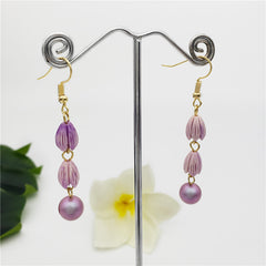 Earrings With Pikake Flower Beads And A Pearl In Different Colors