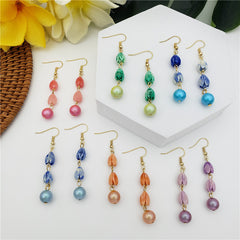 Earrings With Pikake Flower Beads And A Pearl In Different Colors