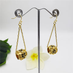 Chain Earrings With A Barrel In Different Styles