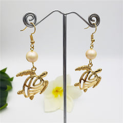 Hawaiian Sea Turtle Earrings Sustained With A Pearl In Different Styles And Colors