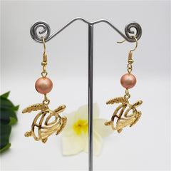 Hawaiian Sea Turtle Earrings Sustained With A Pearl In Different Styles And Colors