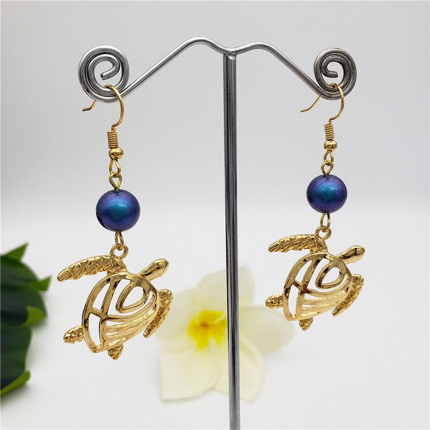 Hawaiian Sea Turtle Earrings Sustained With A Pearl In Different Styles And Colors