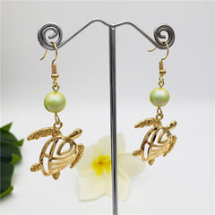 Hawaiian Sea Turtle Earrings Sustained With A Pearl In Different Styles And Colors