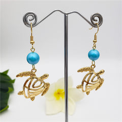 Hawaiian Sea Turtle Earrings Sustained With A Pearl In Different Styles And Colors