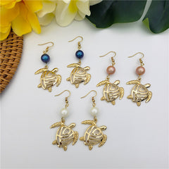 Hawaiian Sea Turtle Earrings Sustained With A Pearl In Different Styles And Colors