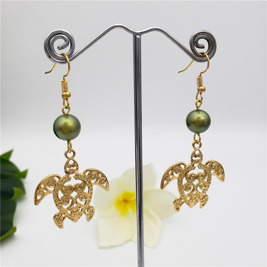 Hawaiian Sea Turtle Earrings Sustained With A Pearl In Different Styles And Colors