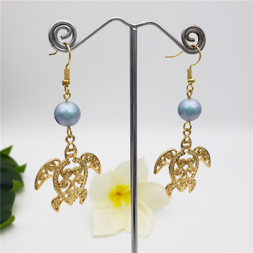 Hawaiian Sea Turtle Earrings Sustained With A Pearl In Different Styles And Colors