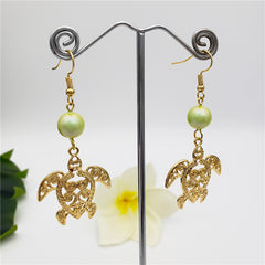 Hawaiian Sea Turtle Earrings Sustained With A Pearl In Different Styles And Colors