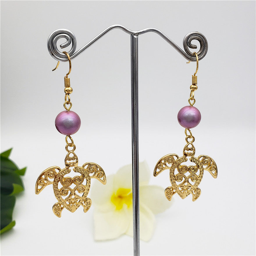 Hawaiian Sea Turtle Earrings Sustained With A Pearl In Different Styles And Colors