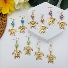 Hawaiian Sea Turtle Earrings Sustained With A Pearl In Different Styles And Colors