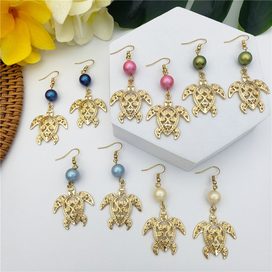 Hawaiian Sea Turtle Earrings Sustained With A Pearl In Different Styles And Colors