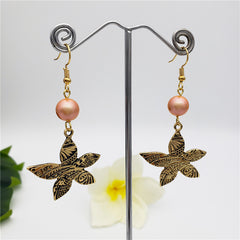 Carved Plumeria Flower Earrings Sustained With A Pearl In Different Styles And Colors