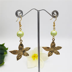 Carved Plumeria Flower Earrings Sustained With A Pearl In Different Styles And Colors