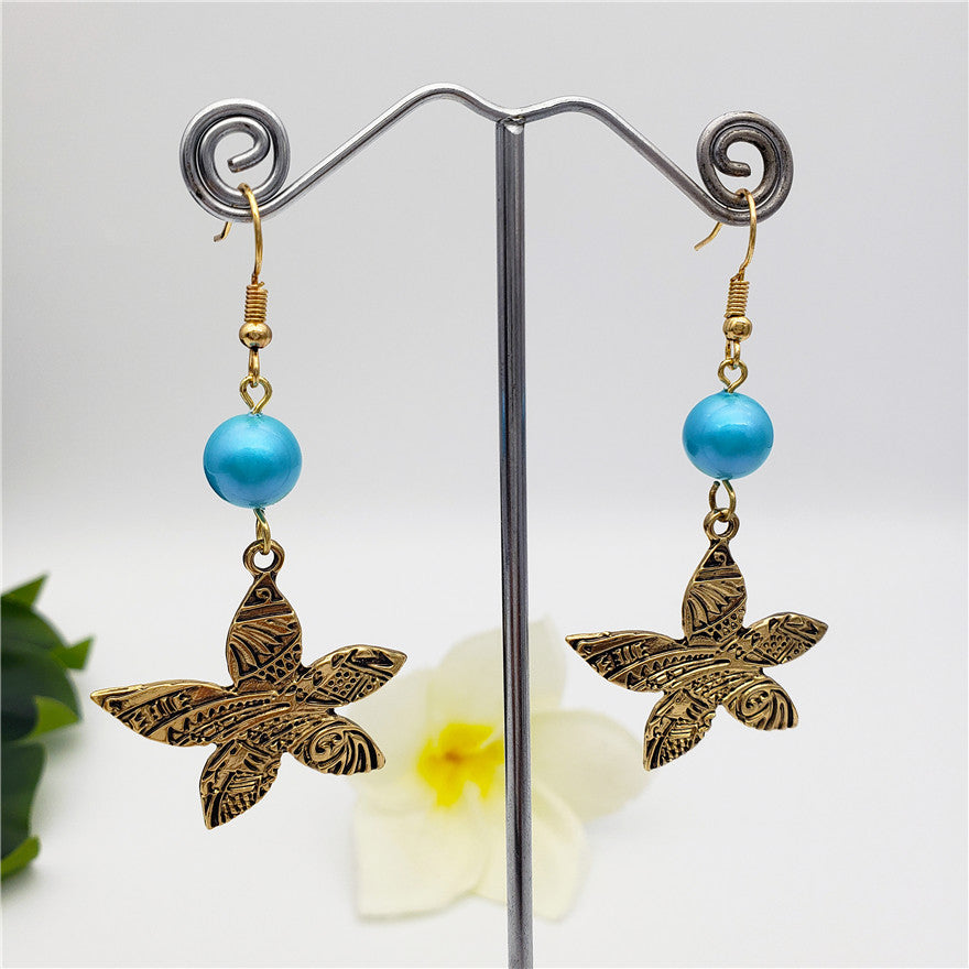 Carved Plumeria Flower Earrings Sustained With A Pearl In Different Styles And Colors