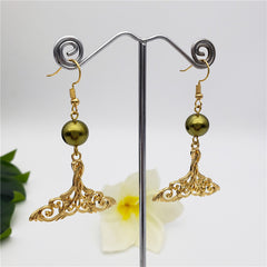 Carved Fish Tail Earrings With A Pearl In Different Colors