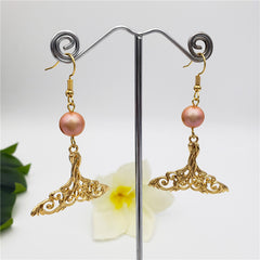 Carved Fish Tail Earrings With A Pearl In Different Colors