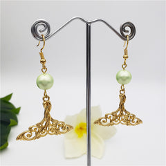 Carved Fish Tail Earrings With A Pearl In Different Colors