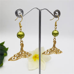 Carved Fish Tail Earrings With A Pearl In Different Colors