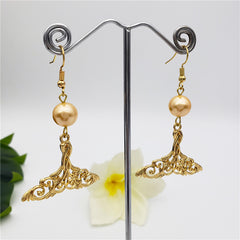 Carved Fish Tail Earrings With A Pearl In Different Colors