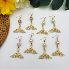 Carved Fish Tail Earrings With A Pearl In Different Colors