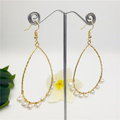 Big Teardrop Earrings Sustained With Light Silver Pearls