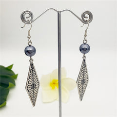 Diamond Shape Leaf Earrings In Silver/Gold Sustained With A Petrol Pearl