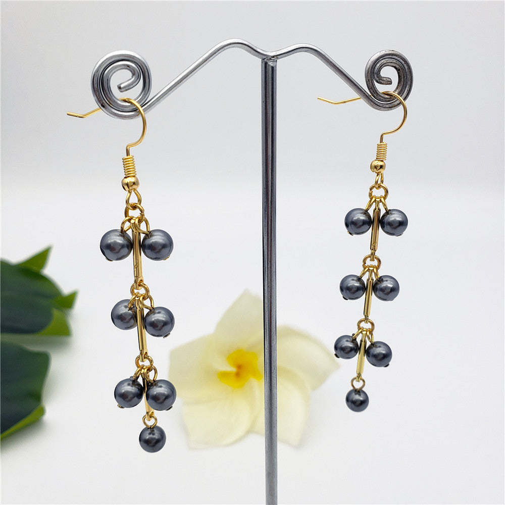 Mistletoe Branch Earrings Sustained With Petrol Pearls