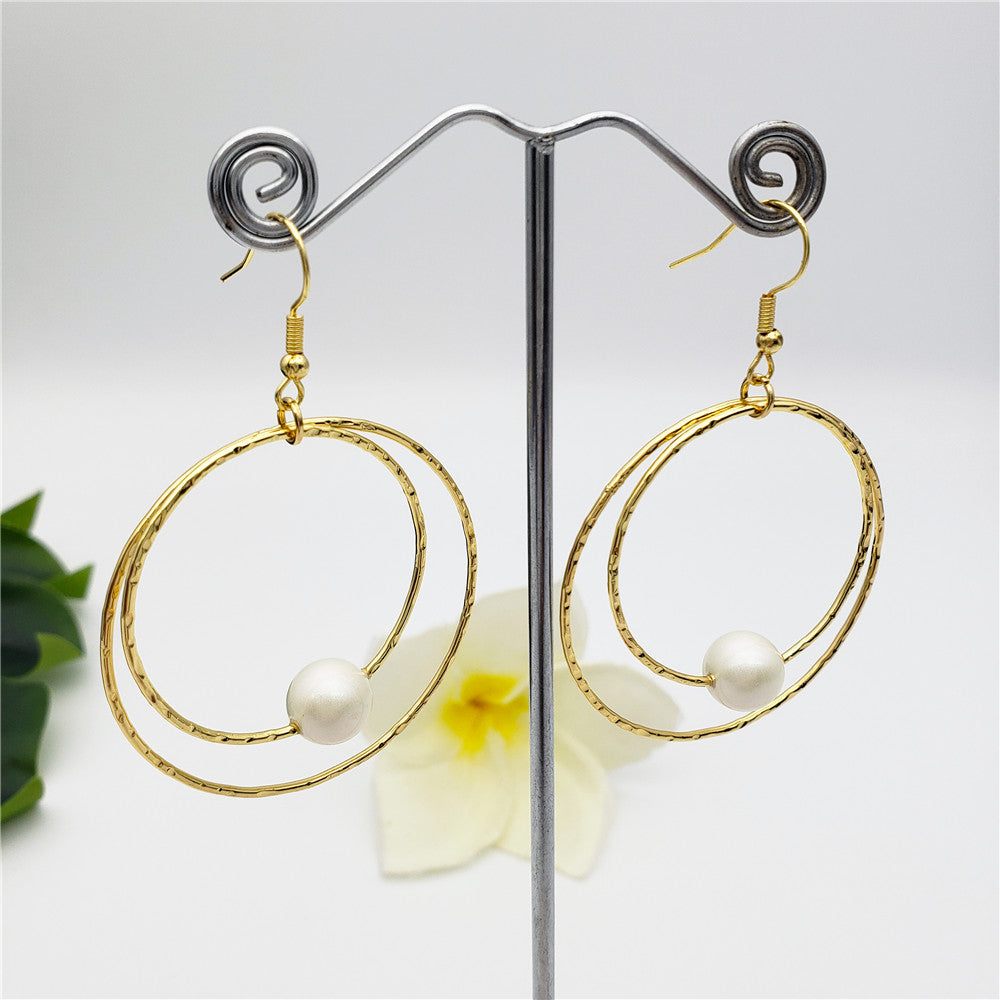 Double Moon Earrings With A Pearl In Different Colors