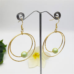 Double Moon Earrings With A Pearl In Different Colors