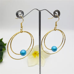 Double Moon Earrings With A Pearl In Different Colors