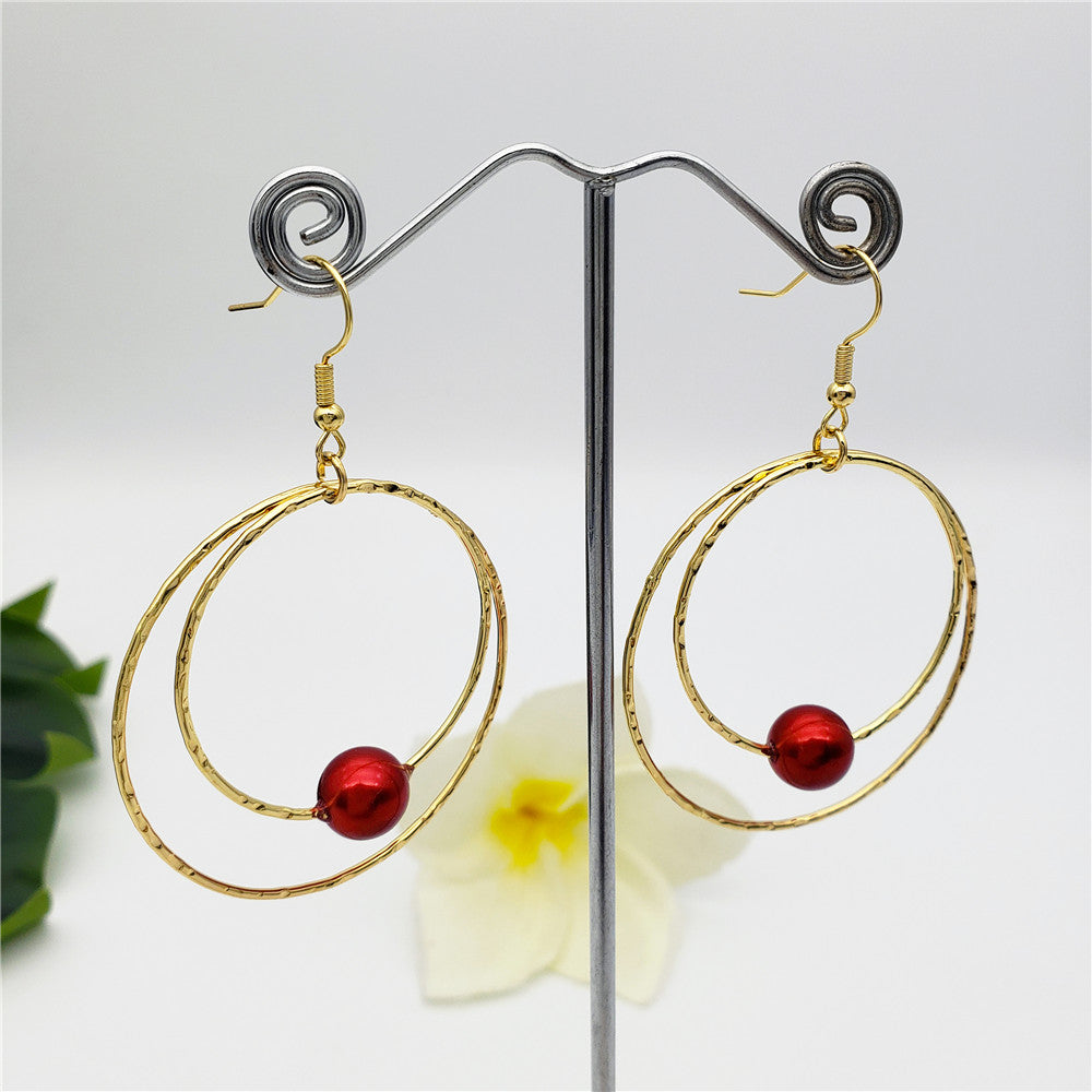 Double Moon Earrings With A Pearl In Different Colors