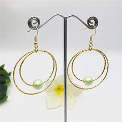 Double Moon Earrings With A Pearl In Different Colors