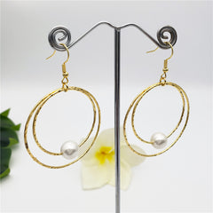 Double Moon Earrings With A Pearl In Different Colors