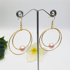 Double Moon Earrings With A Pearl In Different Colors