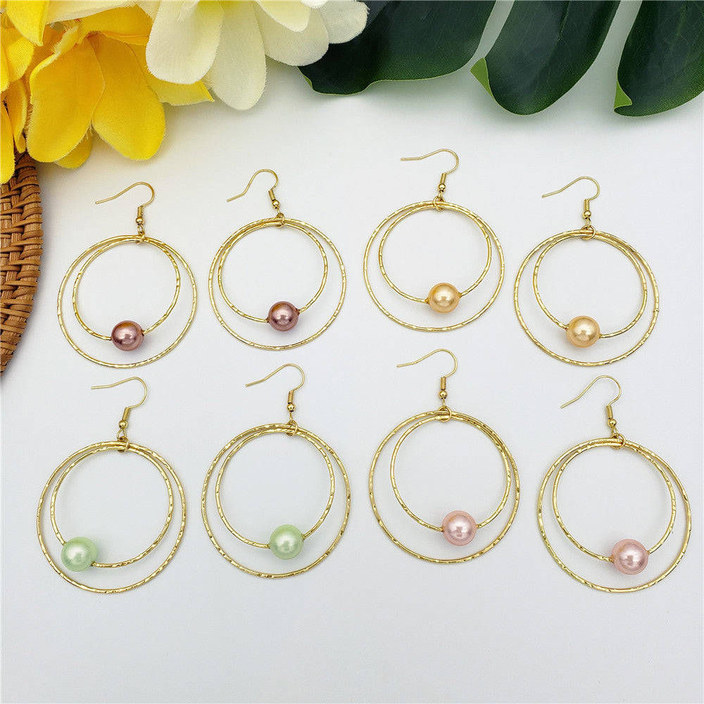 Double Moon Earrings With A Pearl In Different Colors