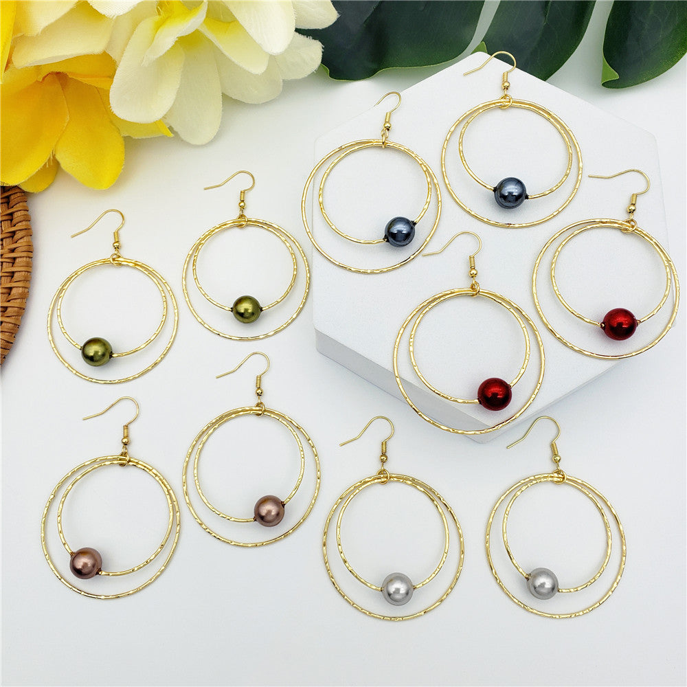 Double Moon Earrings With A Pearl In Different Colors