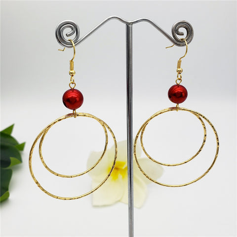 Double Moon Earrings Sustained With A Pearl In 2 Different Colors