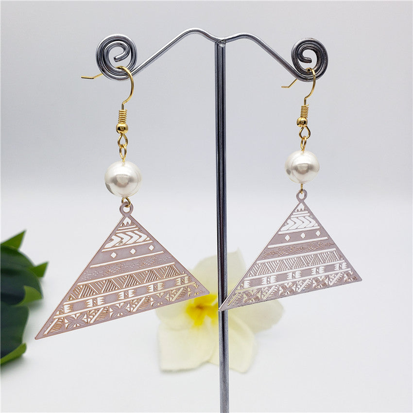 Carved Pyramid Earrings Sustained With A Pearl In Different Colors