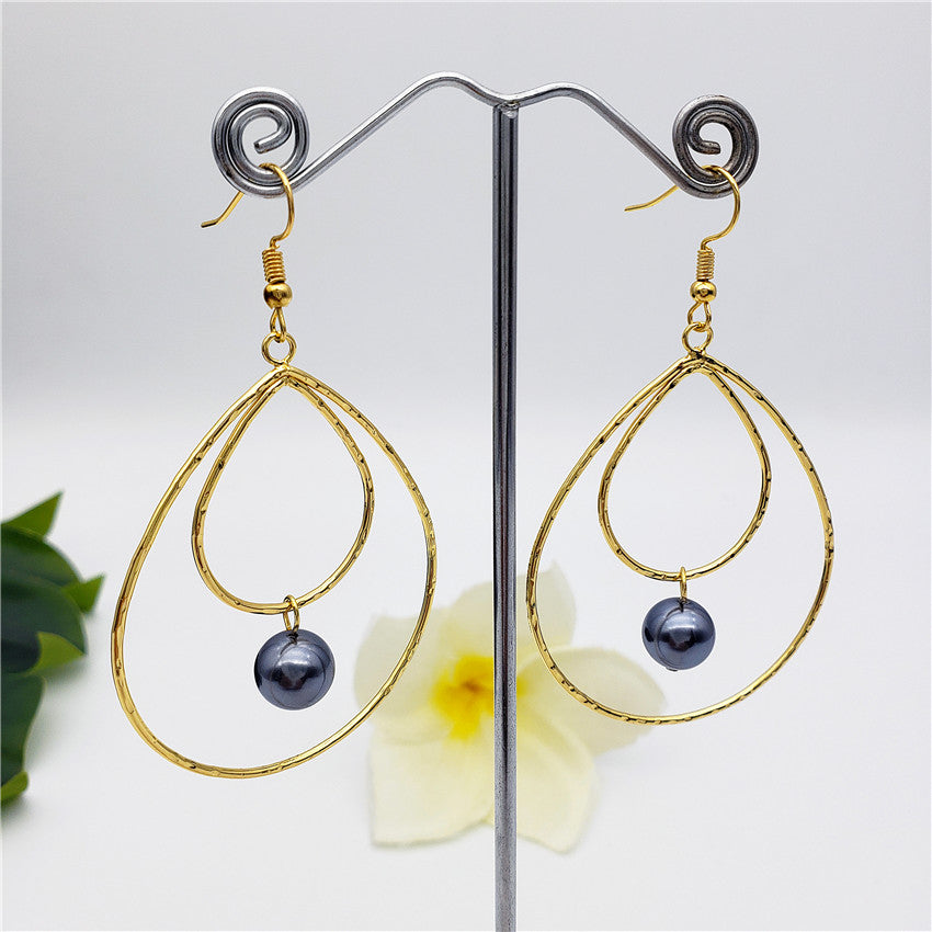 Double Teardrop Earrings With A Pearl In Different Colors