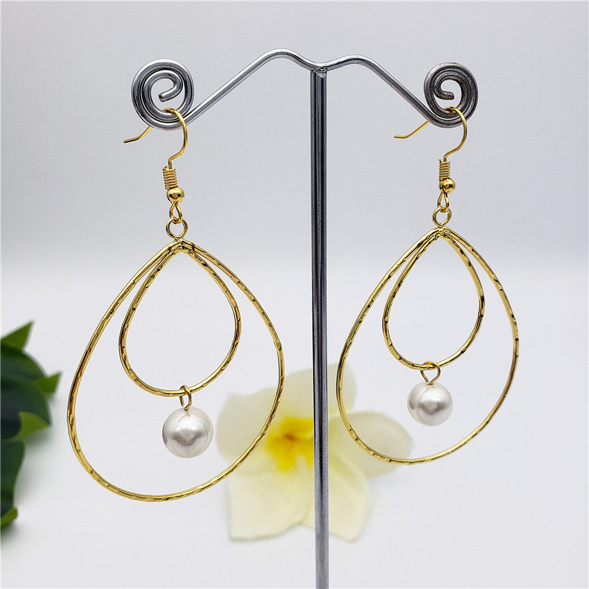 Double Teardrop Earrings With A Pearl In Different Colors