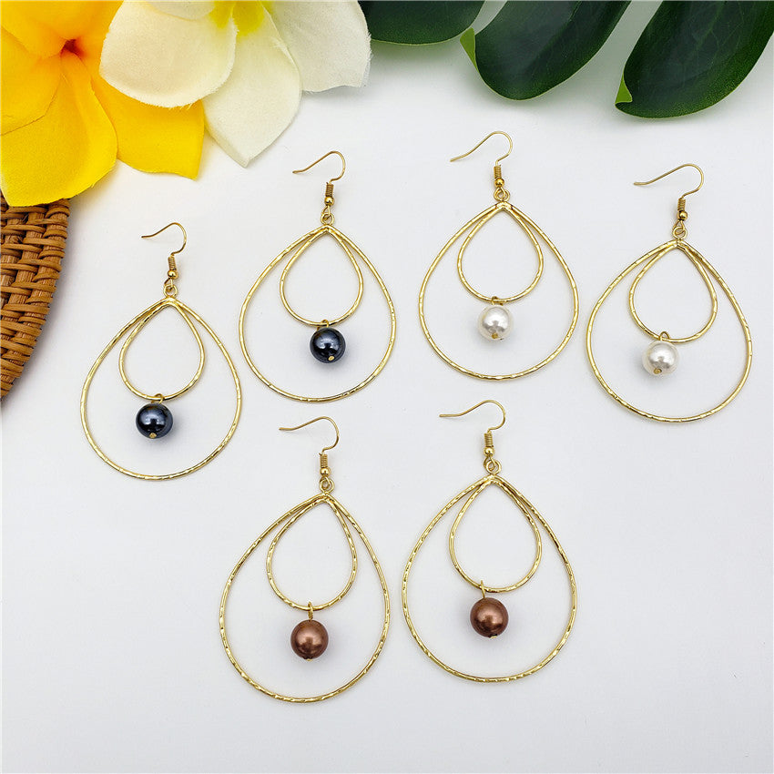 Double Teardrop Earrings With A Pearl In Different Colors