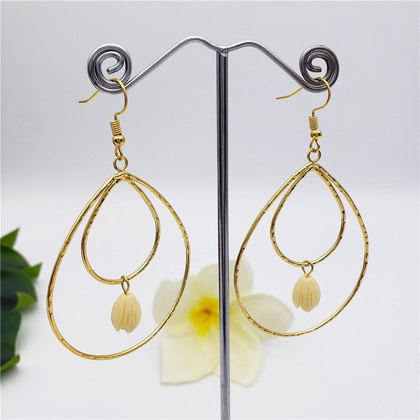 Teardrop Shaped Earrings In 2 Different Styles Sustained With Ivory Color Pikake Flower Beads