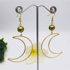 Crescent Moon Earrings Sustained With A Pearl In Different Colors