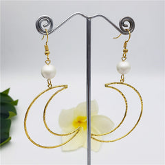 Crescent Moon Earrings Sustained With A Pearl In Different Colors