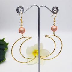 Crescent Moon Earrings Sustained With A Pearl In Different Colors