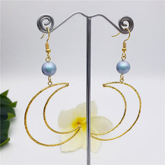 Crescent Moon Earrings Sustained With A Pearl In Different Colors