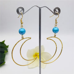 Crescent Moon Earrings Sustained With A Pearl In Different Colors